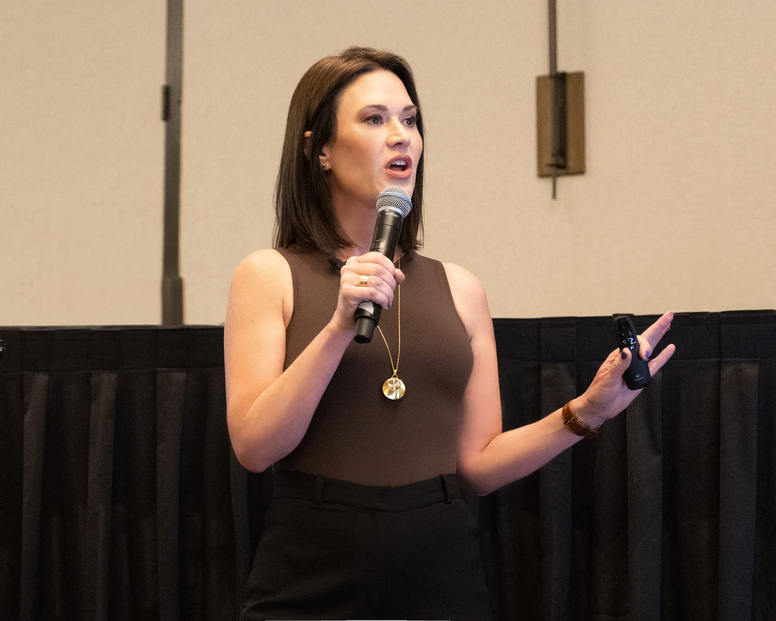 kathyn speaking in front of an audience